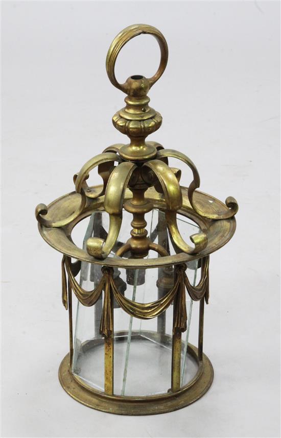 A heavy Edwardian brass hall lantern, drop 21in.